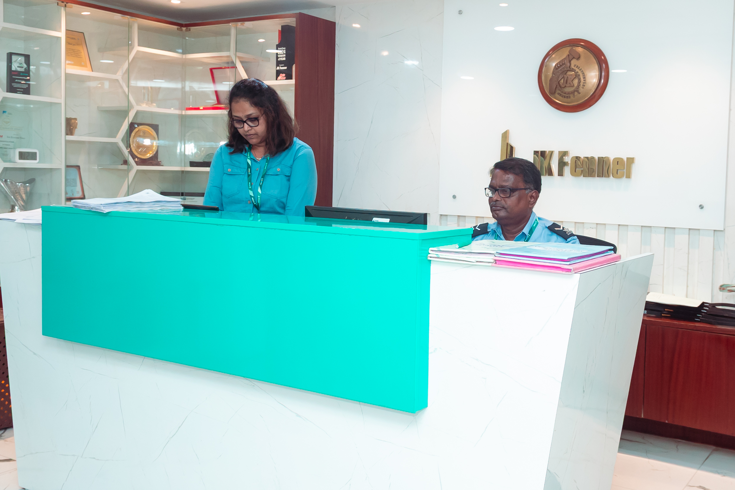 JK Fenner employee at a workstation